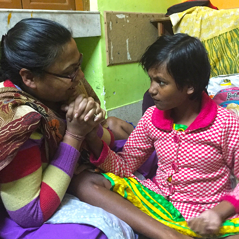 Puja Bagh with her teacher