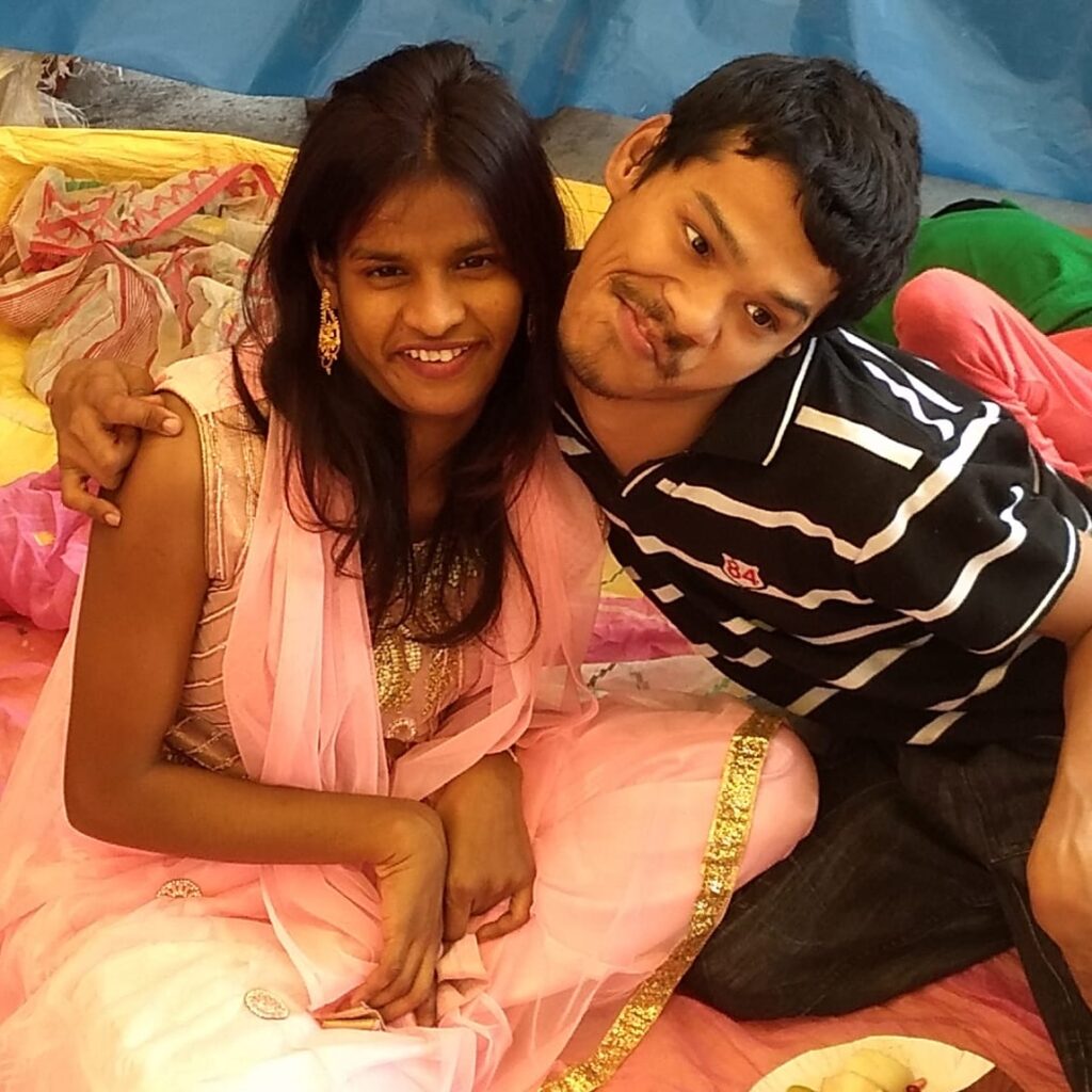 Lali and Ashok sharing a moment